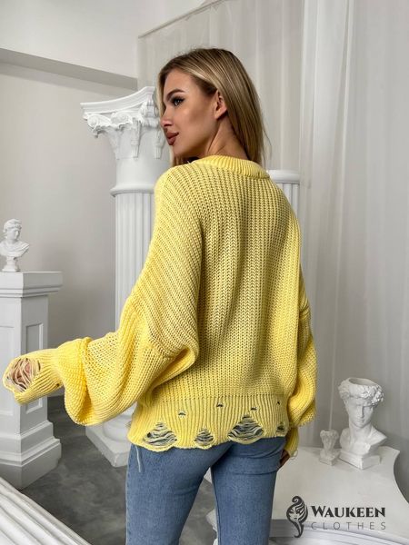 Жіночий светр з дірками жовтого кольору 407251 407251 фото