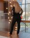 Жіночий брючний костюм з крепдайвінгу чорного кольору з злотом золотом р.50/52 435116 435116 фото 4