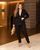 Женский стильный брючный костюм из костюмной ткани средней плотности черного цвета р.48/50 374526 383781 фото