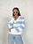 Жіночий светр із V-подібним вирізом колір молочний-блакитний р.42/46 432196 432196 фото