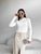 Жіночий светр із текстурним візерунком колір молочний р.42/46 441952 441952 фото