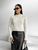 Жіночий светр із текстурним візерунком колір світло-бежевий р.42/46 441959 441959 фото