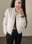 Жіноча курточка колір білий р.42/44 454247 454247 фото