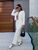 Жіночий костюм-двійка колір білий р.42/44 453236 453236 фото