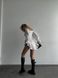 Жіночий комбінезон із шортами-спідницею колір білий р.46/48 454067 454067 фото 4
