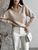 Жіночий светр-поло колір світло-бежевий р.42/46 450417 450417 фото