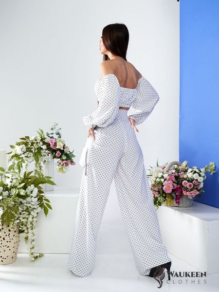 Жіночий костюм топ і штани палаццо білого кольору р.L 387296 387296 фото