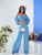 Жіночий костюм топ і штани палаццо блакитного кольору р.L 387293 387293 фото