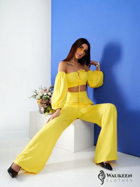 Жіночий костюм топ і штани палаццо жовтого кольору р.XS 387271 387281 фото