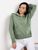 Жіночий светр із двома кишенями оливкового кольору р.42/46 405082 405082 фото