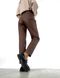Жіночі штани з еко шкіри колір коричневий р.46/48 443978 443978 фото 3