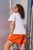 Жіночий костюм футболка та шорти колір помаранчевий р.50/52 433805 433805 фото