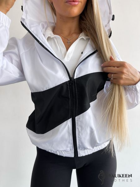 Жіноча куртка-вітрівка з капюшоном колір білий р.42/46 454224 454224 фото