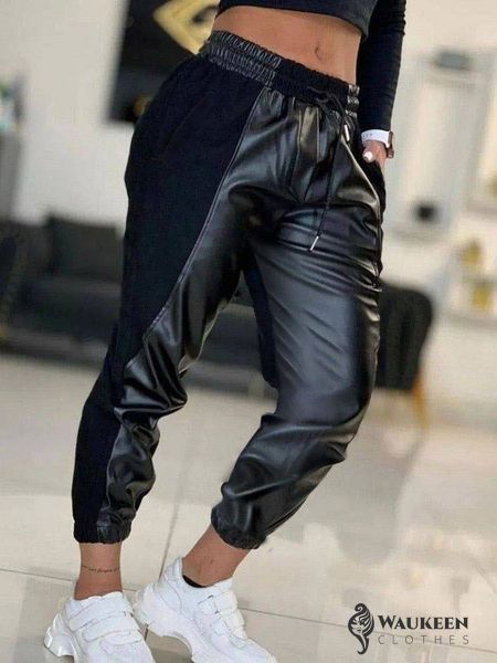 Жіночі штани джогери колір чорний р.50/52 449594 449594 фото