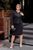 Жіночий костюм спідниця та жакет чорного кольору р.48/50 377759 377759 фото