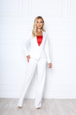 Жіночий брючний костюм асиметрія білого кольору на підкладці р.40 372780 372780 фото