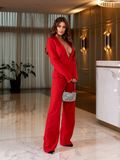 Жіночий брючний костюм асиметрія червоного кольору на підкладці розмір р.48 378372 378372 фото