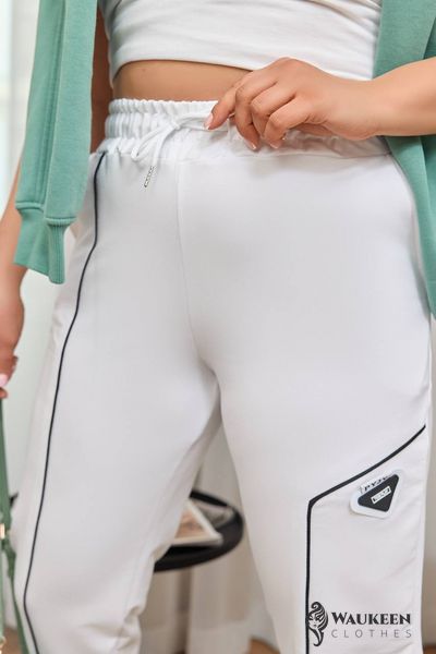 Жіночі штани джогери колір білий р.50/52 450267 450267 фото