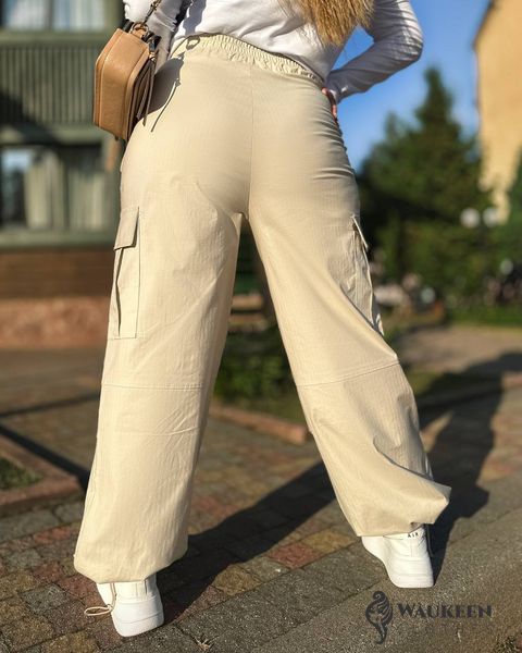 Жіночі брюки карго колір беж р.50/52 440158 440158 фото